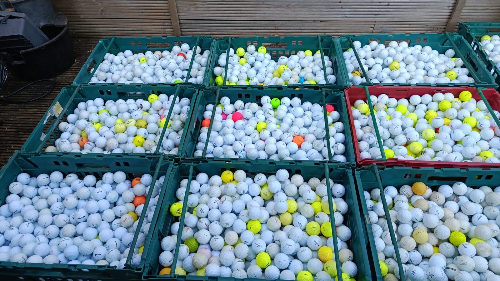 Golf balls being sorted